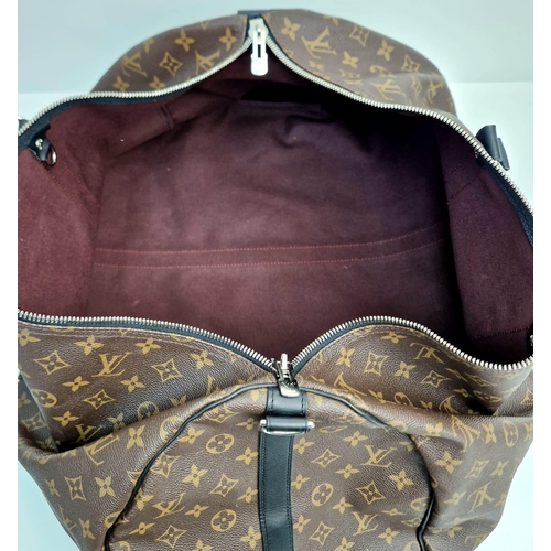 184 - A Louis Vuitton Keepall Hand-Luggage Bag. Brown monogram canvas with black leather handles and trim.... 