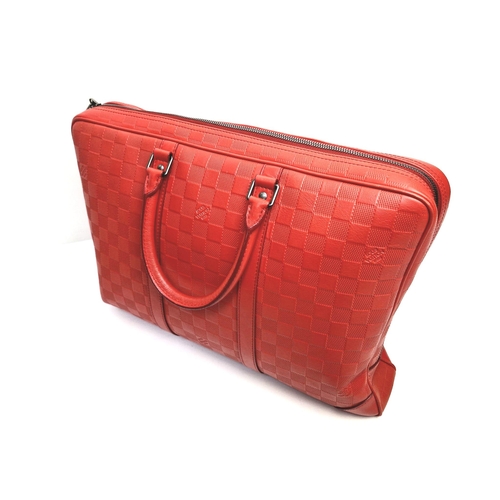 21 - A Louis Vuitton Red Leather Document Bag. Monogram checked red leather. Silver-tone hardware with pa... 