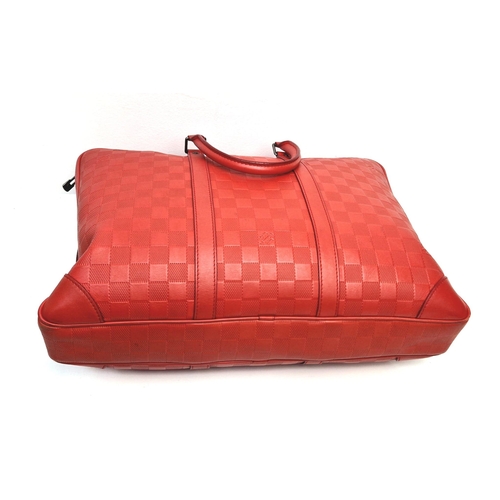 21 - A Louis Vuitton Red Leather Document Bag. Monogram checked red leather. Silver-tone hardware with pa... 