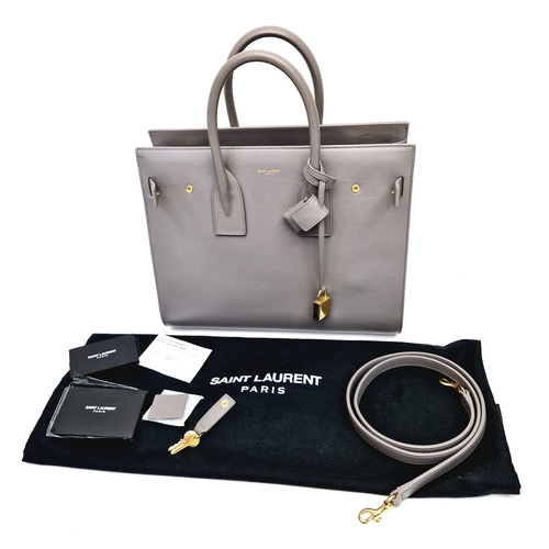 366 - An Elegant Saint Laurent Sac de Jour Grey Leather Handbag. Luxurious soft grey leather. Multiple int... 