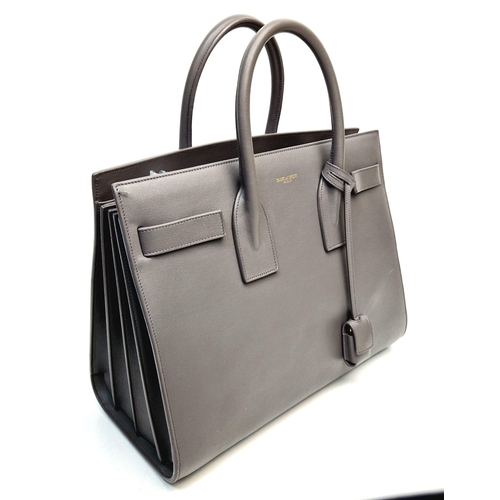 366 - An Elegant Saint Laurent Sac de Jour Grey Leather Handbag. Luxurious soft grey leather. Multiple int... 