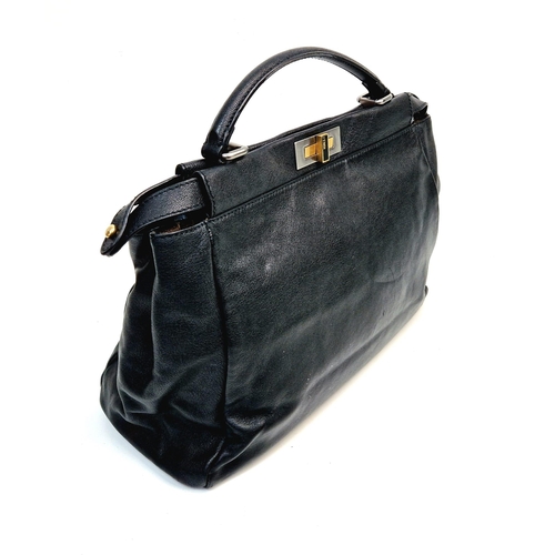 416 - A Fendi Black Leather Double Compartment Hand/Shoulder Bag. Silver and gold tone hardware. Detachabl... 