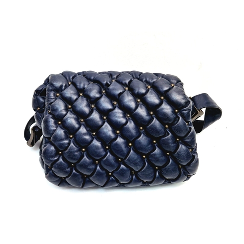 513 - A Balanciaga Blue Leather Puff Bag. Adjustable handle. Quilted soft blue leather. Interior zip pocke... 