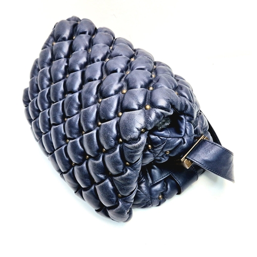 513 - A Balanciaga Blue Leather Puff Bag. Adjustable handle. Quilted soft blue leather. Interior zip pocke... 