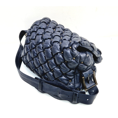 513 - A Balanciaga Blue Leather Puff Bag. Adjustable handle. Quilted soft blue leather. Interior zip pocke... 