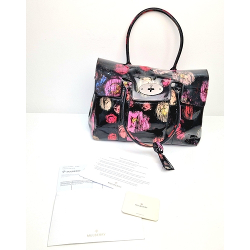 661 - A Mulberry Classic Bayswater Patent Leather Handbag. Decorated with scribbly floral print. Gunmetal ... 