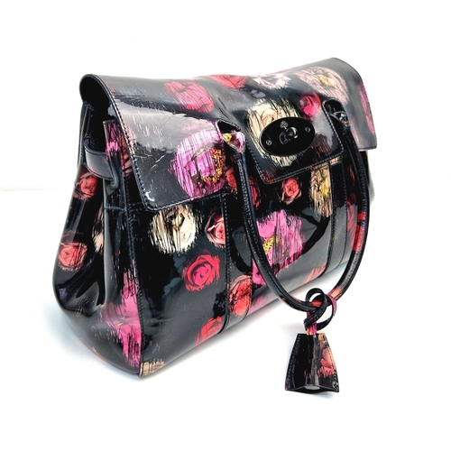 661 - A Mulberry Classic Bayswater Patent Leather Handbag. Decorated with scribbly floral print. Gunmetal ... 