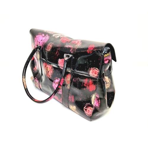 661 - A Mulberry Classic Bayswater Patent Leather Handbag. Decorated with scribbly floral print. Gunmetal ... 