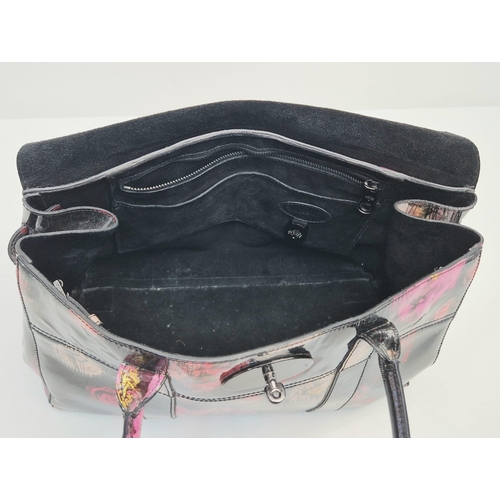 661 - A Mulberry Classic Bayswater Patent Leather Handbag. Decorated with scribbly floral print. Gunmetal ... 