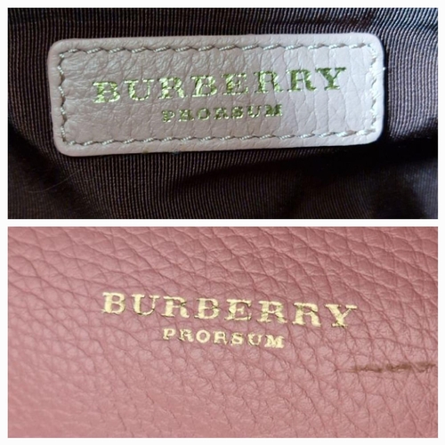 663 - A Burberry Prorsum Crossbody Pink Leather Bag. Gold-tone hardware. Fur trim. Adjustable shoulder str... 