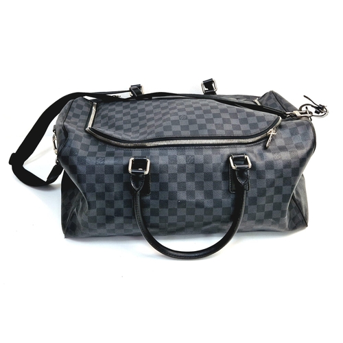 68 - A Louis Vuitton Keepall Hand-Luggage Bag. Black checked leather. Leather handles and trim. Shoulder ... 