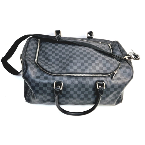 68 - A Louis Vuitton Keepall Hand-Luggage Bag. Black checked leather. Leather handles and trim. Shoulder ... 