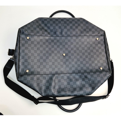 68 - A Louis Vuitton Keepall Hand-Luggage Bag. Black checked leather. Leather handles and trim. Shoulder ... 