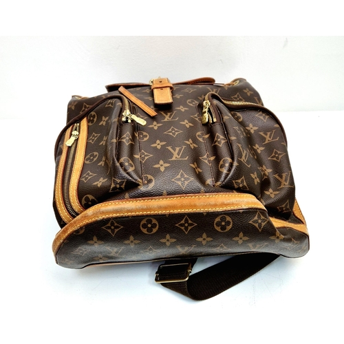 A Louis Vuitton Backpack. Monogram brown canvas. Leather trim. Zipped  exterior pockets. Thick cloth