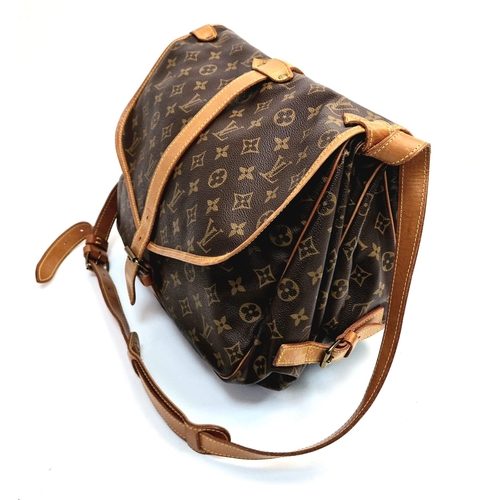 766 - A Louis Vuitton Dual Satchel Shoulder Bag. Monogram brown canvas. Dual side opening. Brown leather h... 