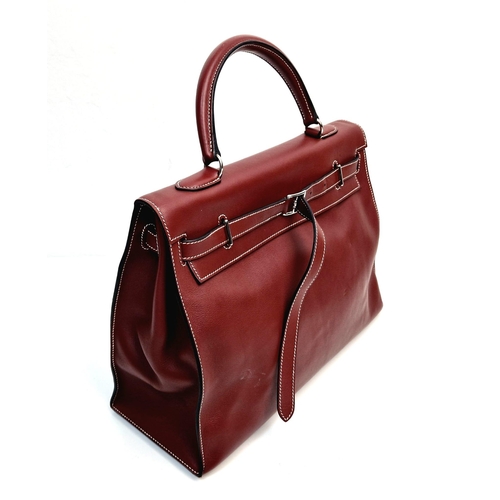 89 - A Hermes Kelly Brown Leather Handbag. Simple elegance with the softest of leather and buckle design.... 