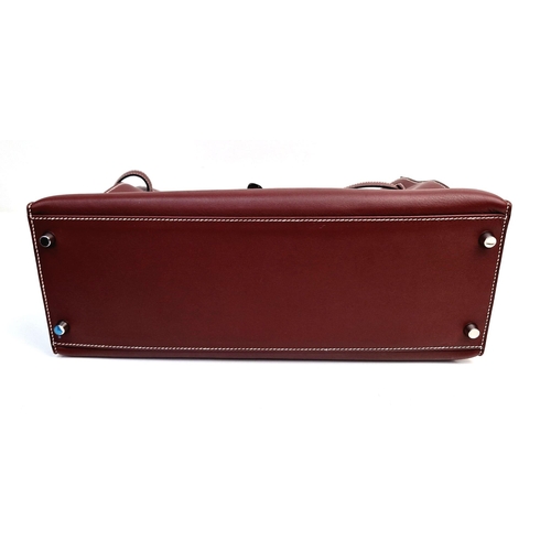 89 - A Hermes Kelly Brown Leather Handbag. Simple elegance with the softest of leather and buckle design.... 