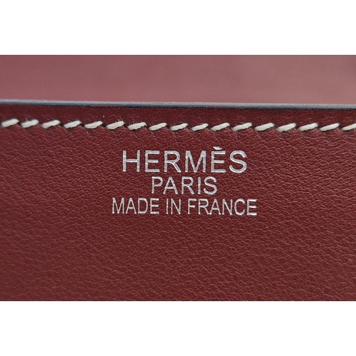 89 - A Hermes Kelly Brown Leather Handbag. Simple elegance with the softest of leather and buckle design.... 