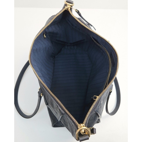 898 - A Louis Vuitton Bleu Infini Monogram Leather PM Bag. Gilded hardware. Outer zipped compartment. Shou... 