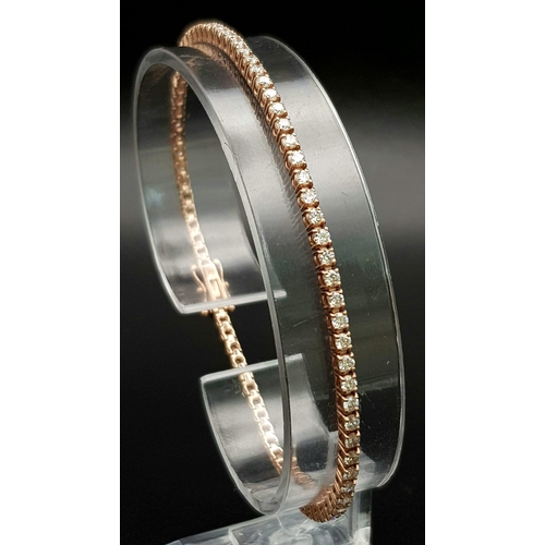 91 - AN 18K ROSE GOLD AND DIAMOND TENNIS BRACELET WITH APPROX 3ct OF HIGH QUALITY DIAMONDS.   8.0gms  18c... 