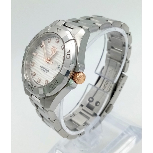 1390 - A Tag Heuer Automatic Aquaracer Ladies Watch. Stainless steel strap and case - 32mm. White dial with... 