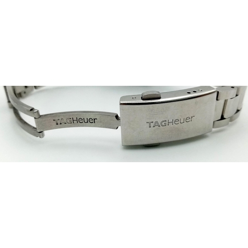 1390 - A Tag Heuer Automatic Aquaracer Ladies Watch. Stainless steel strap and case - 32mm. White dial with... 