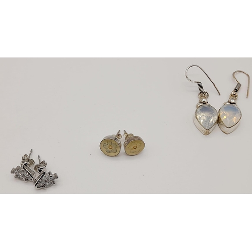 1104 - Three Pairs of 925 Silver Earrings. Swan stud, Floral stud and Moonstone drop.