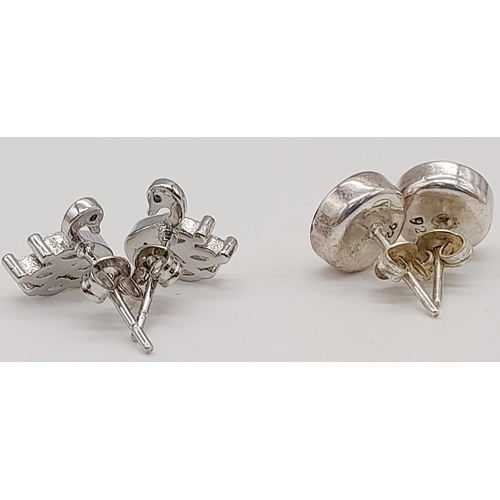 1104 - Three Pairs of 925 Silver Earrings. Swan stud, Floral stud and Moonstone drop.