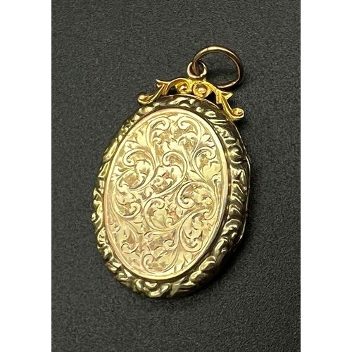 1125 - An Antique 9K Back and Front Gold Locket Pendant. 4cm. 4.06g total weight.