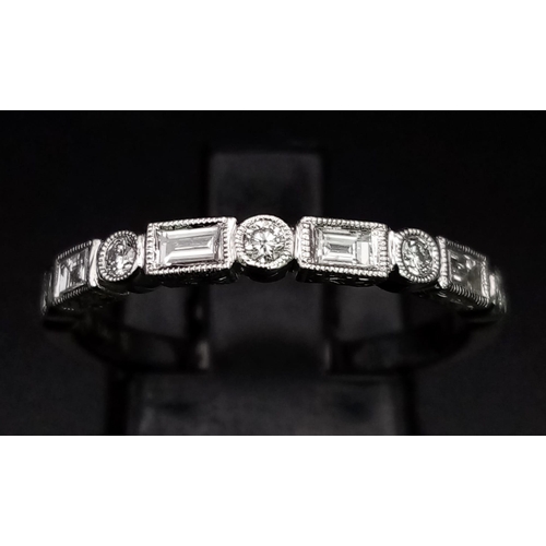 1194 - A 9K White Gold Diamond Half-Eternity Ring. Size N. 2g total weight. Ref: 38