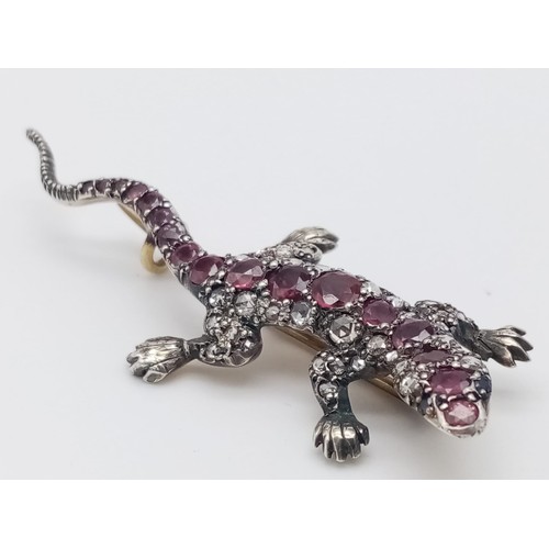 1207 - A Rare Victorian Ruby and Diamond High-Karat Salamander Brooch. Vibrant rubies and diamonds set in s... 