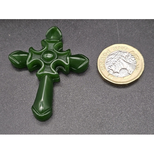 1368 - A Green Jade Cross Pendant. 4.5 x 5cm