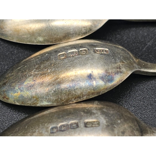 179 - A SET OF 6 HALLMARKED SILVER TEASPOONS DATED 1922  64.7gms.