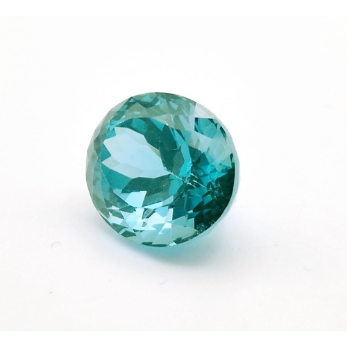 459 - A Beautiful Light Blue/Green 35ct Gemstone (possibly tourmaline). Oval cut with a trillion top finis... 