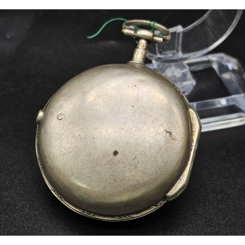 745 - An Antique French White Metal Pocket Watch. A/F. 5.5cm diameter. Ref: 012036