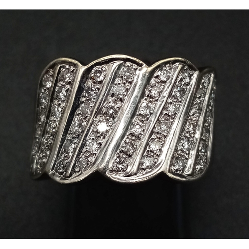 129 - 9K WHITE GOLD DIAMOND FANCY BAND RING.  0.50CT DIAMOND. TOTAL WEIGHT 6.98G.  SIZE M