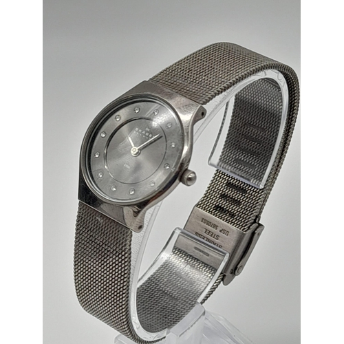 1311 - A SKAGEN OF DENMARK STAINLESS STEEL QUARTZ LADIES WRIST WATCH WITH DIAMOND NUMERALS. a/f