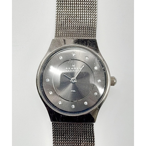 1311 - A SKAGEN OF DENMARK STAINLESS STEEL QUARTZ LADIES WRIST WATCH WITH DIAMOND NUMERALS. a/f