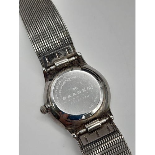 1311 - A SKAGEN OF DENMARK STAINLESS STEEL QUARTZ LADIES WRIST WATCH WITH DIAMOND NUMERALS. a/f