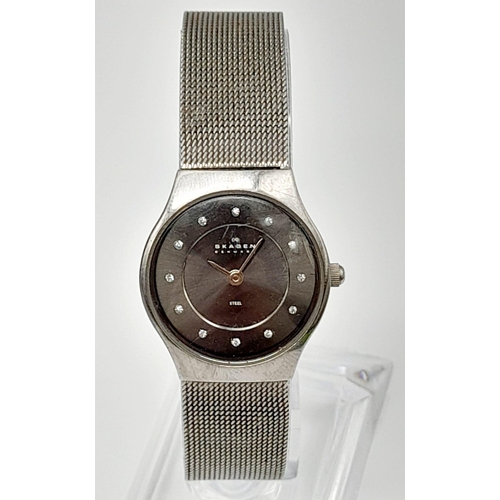 1311 - A SKAGEN OF DENMARK STAINLESS STEEL QUARTZ LADIES WRIST WATCH WITH DIAMOND NUMERALS. a/f