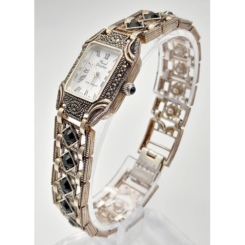 1319 - A MARCEL DRUCKER STONE SET LADIES DRESS WATCH IN STERLING SILVER.