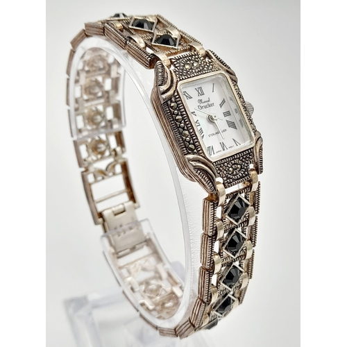 1319 - A MARCEL DRUCKER STONE SET LADIES DRESS WATCH IN STERLING SILVER.