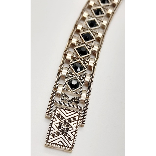 1319 - A MARCEL DRUCKER STONE SET LADIES DRESS WATCH IN STERLING SILVER.