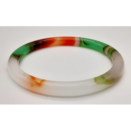 1773 - A Thin Multi-Colour Quality Jade Bangle. 63mm inner diameter. 7mm width.