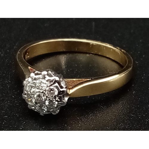 192 - 9K YELLOW GOLDG DIAMOND CLUSTER RING 0.15CT DIAMOND. TOTAL WEIGHT 2.8G. SIZE M 1/2