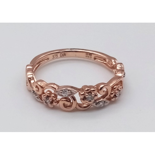 227 - 9K ROSE GOLD DIAMOND SET FANCY BAND RING FLORAL DESIGN. TOTAL WEIGHT  2G. SIZE M