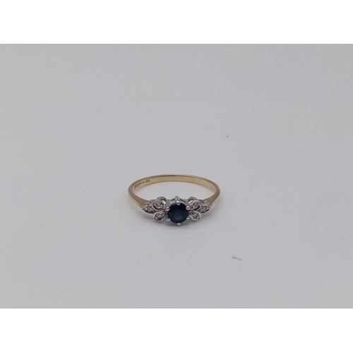 241 - 9K YELLOW GOLD DIAMOND & SAPPHIRE RING. TOTAL WEIGHT 1.3G.  SIZE N/O