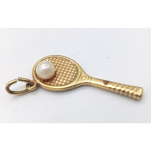 326 - 9K YELLOW GOLD TENNIS RACKET WITH PEARL BALL CHARM 1.46G