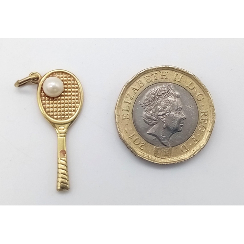 326 - 9K YELLOW GOLD TENNIS RACKET WITH PEARL BALL CHARM 1.46G