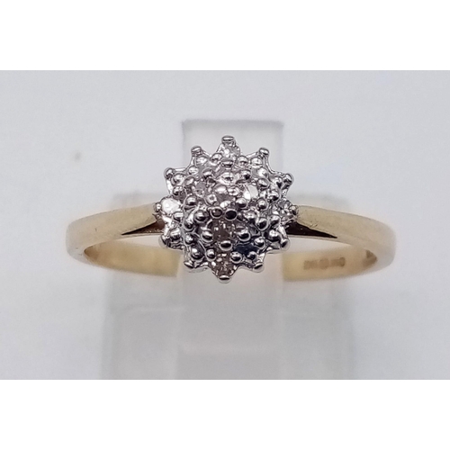 410 - 9K YELLOW GOLD DIAMOND CLUSTER RING.  0.10CT DIAMOND. TOTAL WEIGHT 2G.  SIZE N